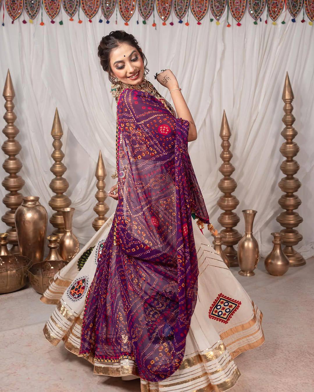 Regal Gujarati Mirror Work Navratri Lehenga Choli with Vibrant Embroidery & Peacock Motifs