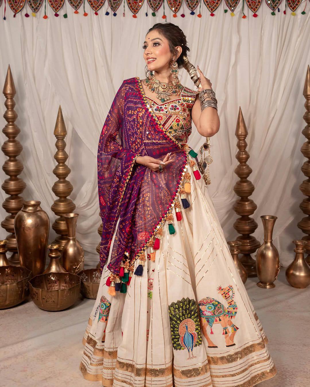 Regal Gujarati Mirror Work Navratri Lehenga Choli with Vibrant Embroidery & Peacock Motifs
