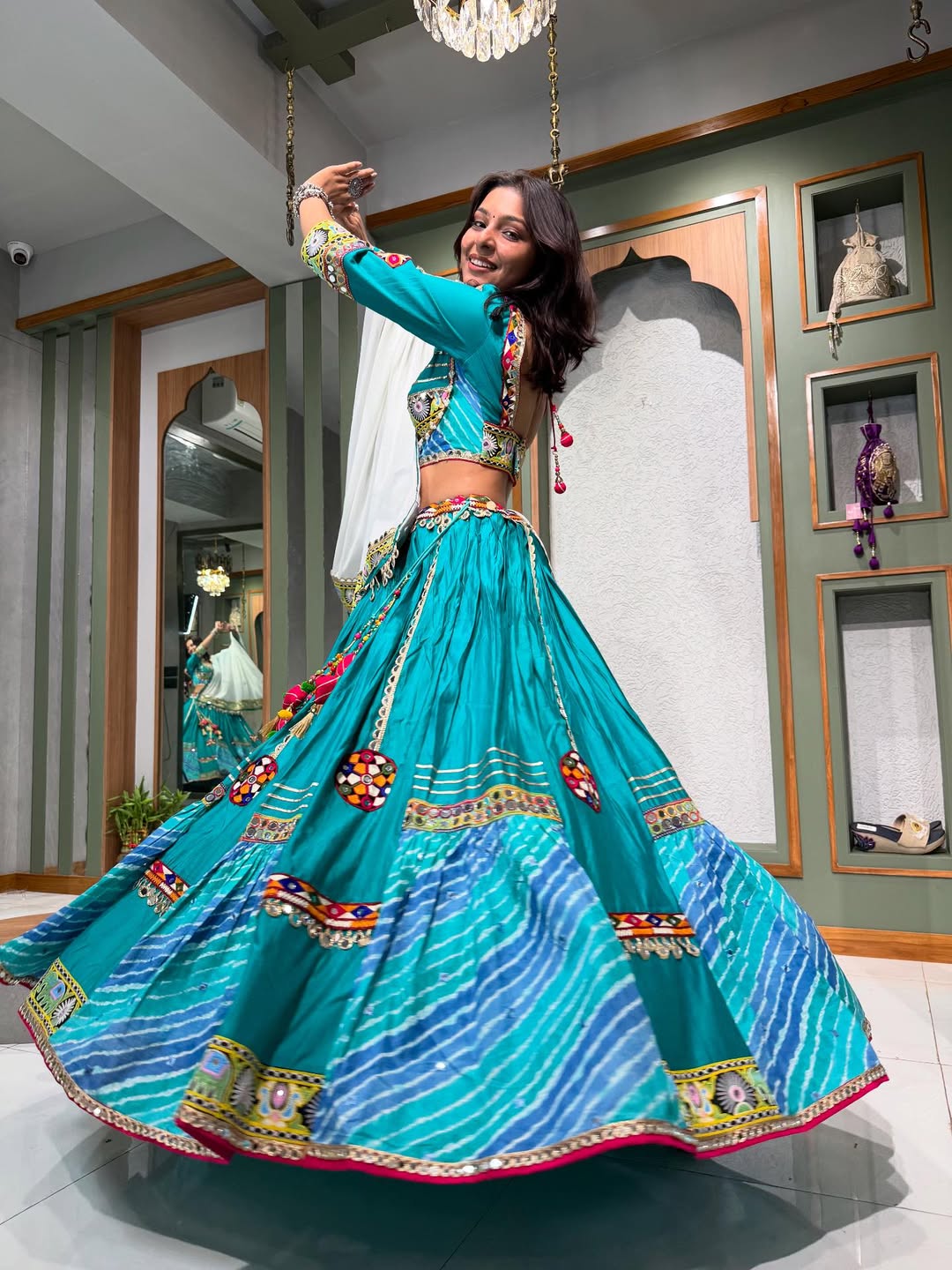 Teal Delight Patola Print Lehenga with Resham & Mirror Work