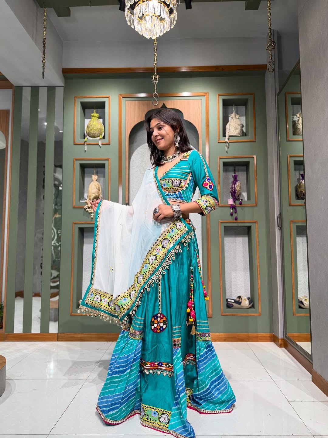 Teal Delight Patola Print Lehenga with Resham & Mirror Work