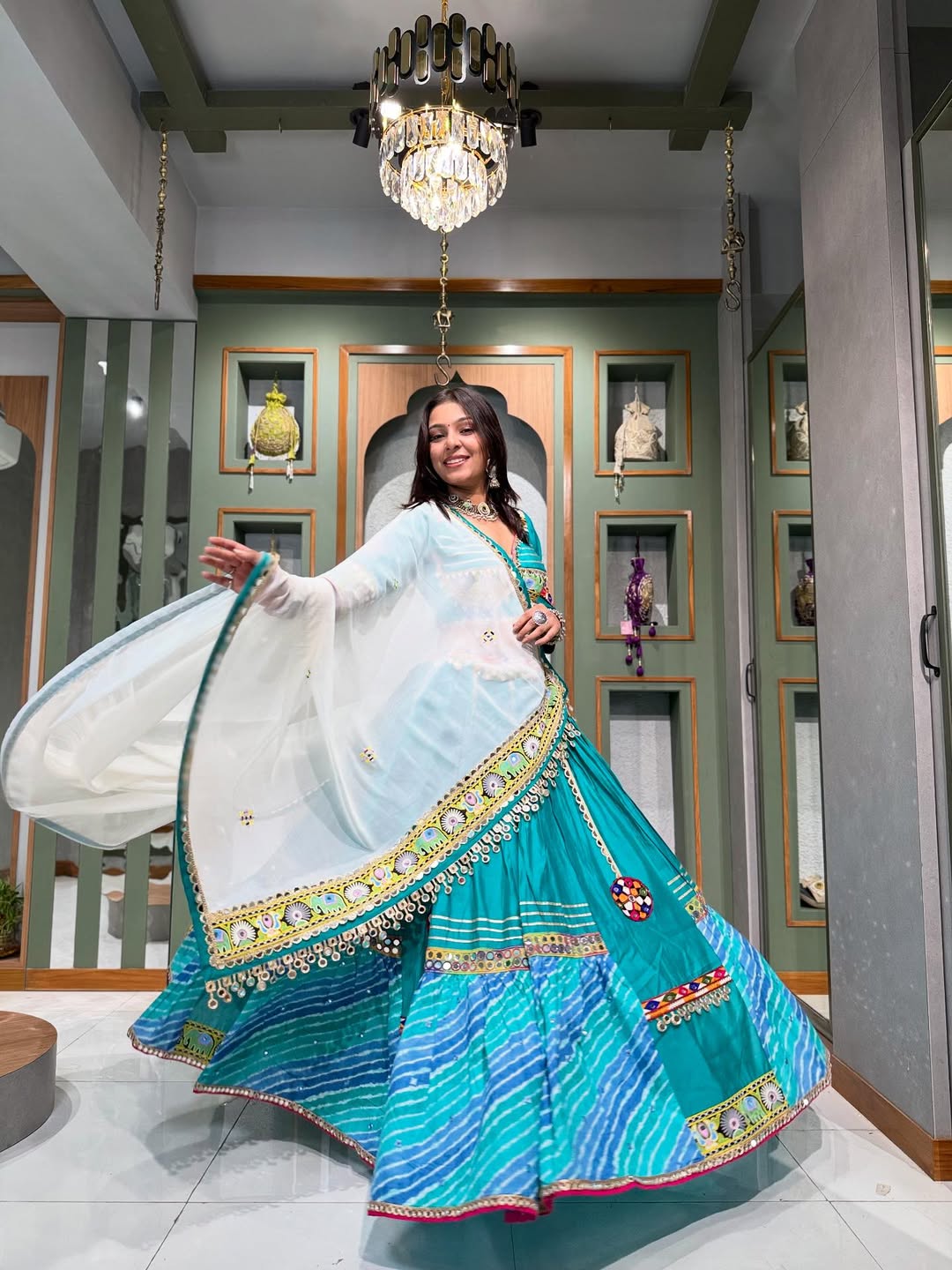 Teal Delight Patola Print Lehenga with Resham & Mirror Work