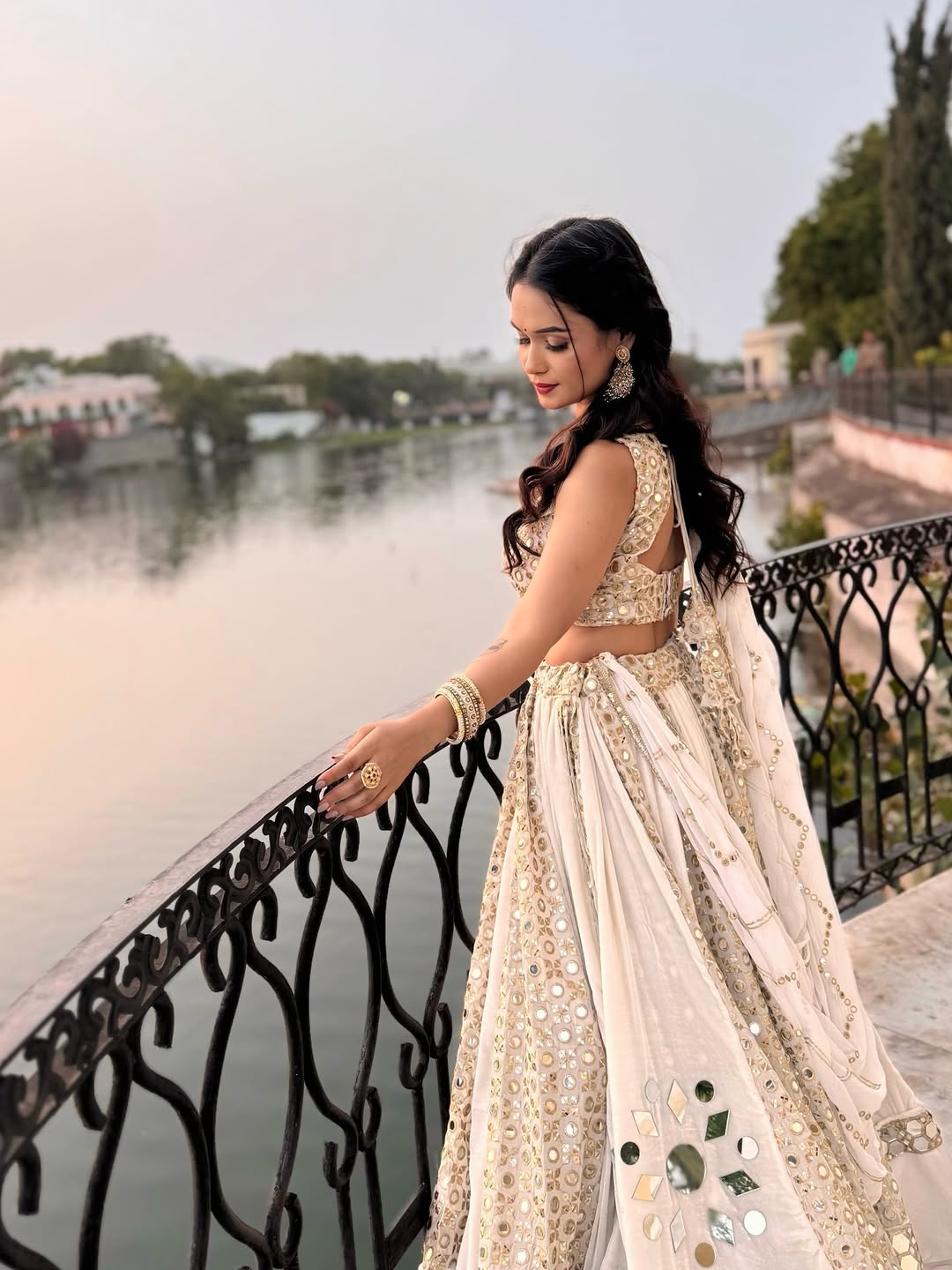 Radiance Reflection White Real Mirror work Lehenga Set